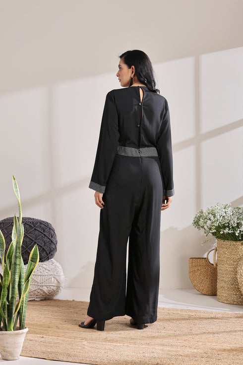 BELTED CHECK JUMPSUIT