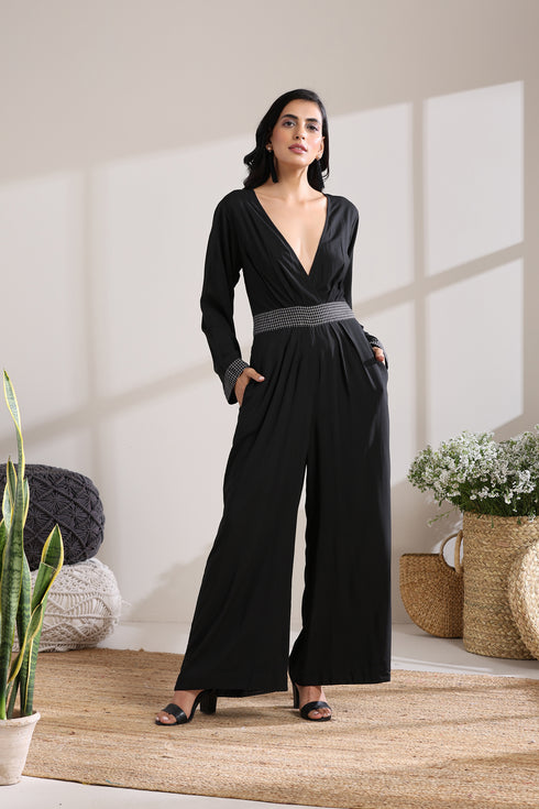 BELTED CHECK JUMPSUIT