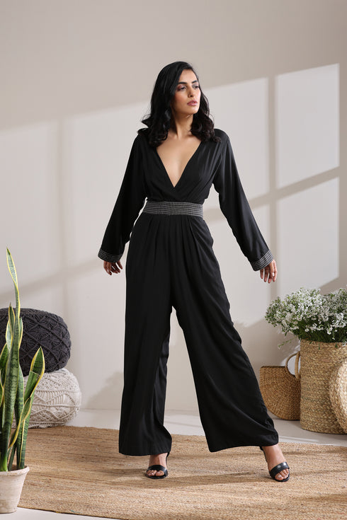 BELTED CHECK JUMPSUIT