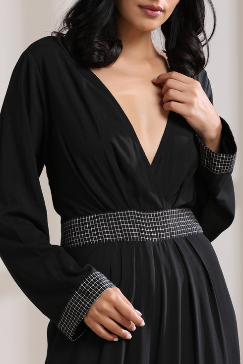BELTED CHECK JUMPSUIT